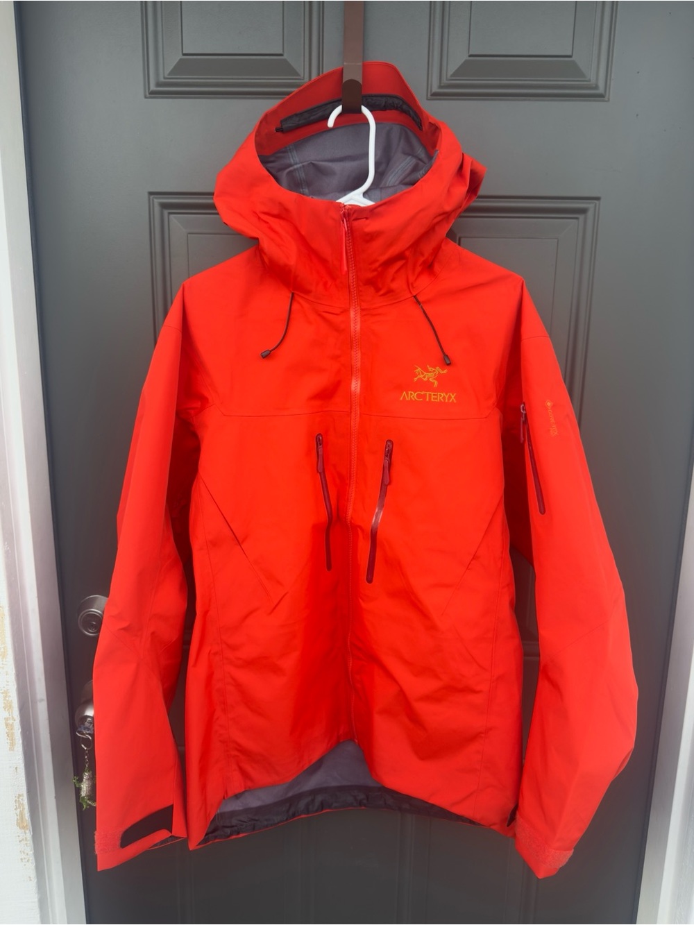 Arc'teryx Men's Bright Red Weatherproof Hooded Performance Jacket